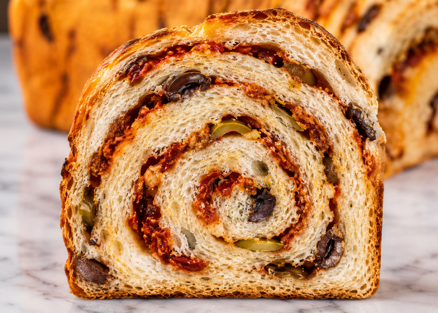 Cheese, sun-dried tomato & olive babka